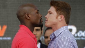 Mayweather and Alvarez face-off during a news conference to announce their fight in Mexico City