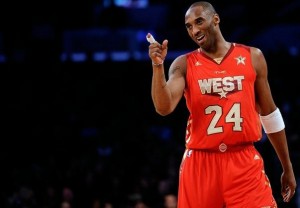 Kobe Bryant smiles and points a finger during the All Star Game 2011